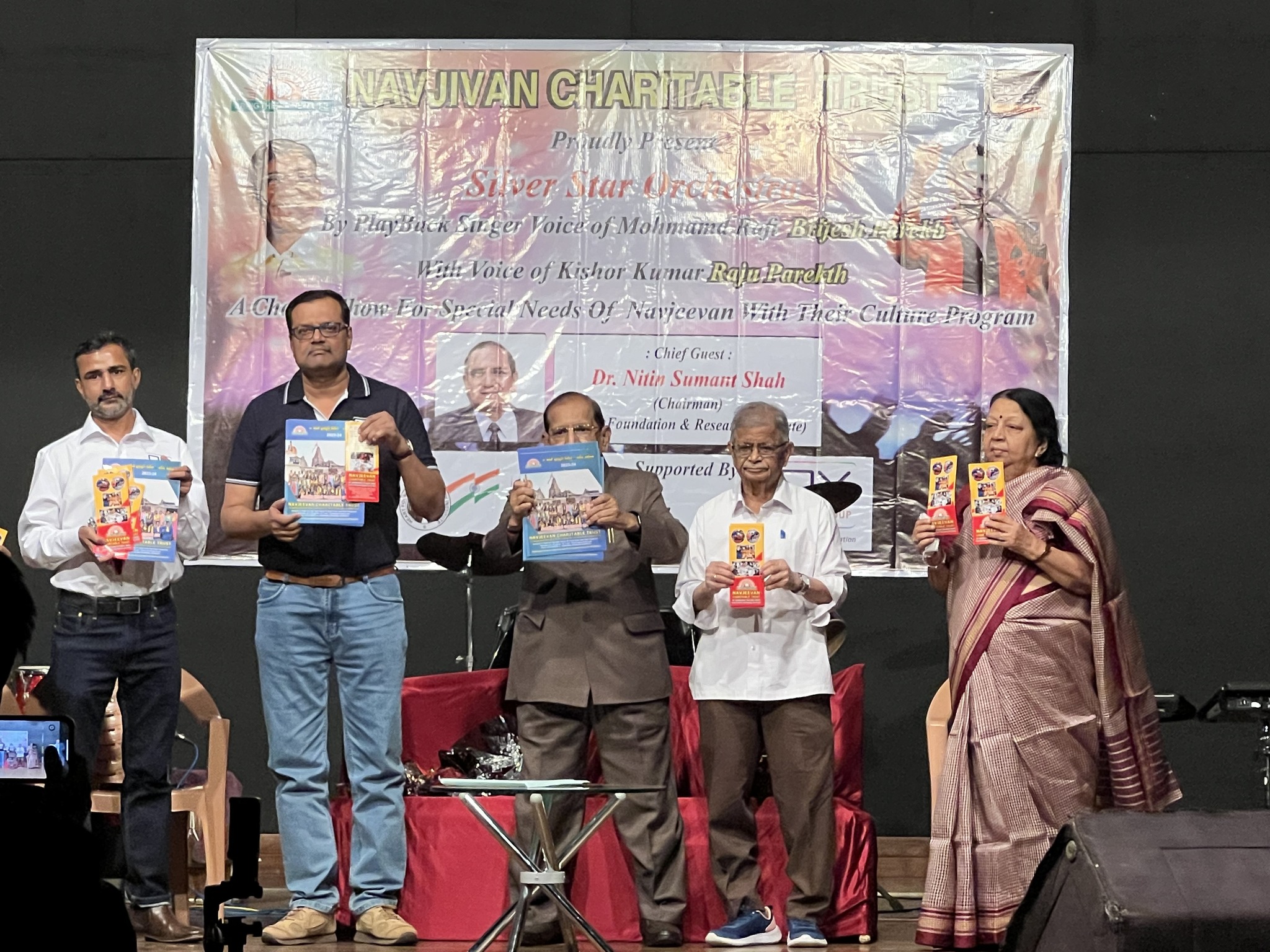 Navjivan Charitable Trust souvenir release and annual report as well as cultural programme